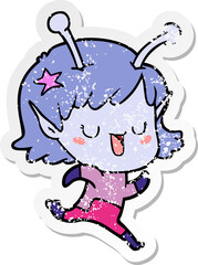 distressed sticker of a happy alien girl cartoon