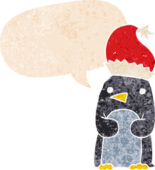 cute christmas penguin with speech bubble in grunge distressed retro textured style