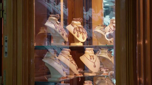 Sets of jewelry in showcase street market in Sousse. Earings and necklaces merchandised by local Sousse sellers.