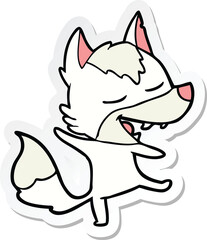 sticker of a cartoon wolf laughing