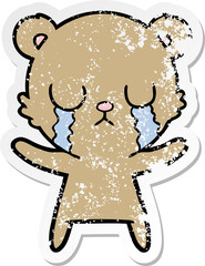 distressed sticker of a crying cartoon bear