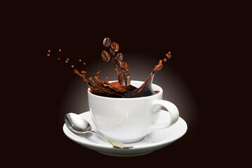 roasted coffee beans falling into splashing coffee of cup on dark background