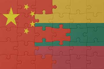 puzzle with the national flag of lithuania and china . macro.concept.