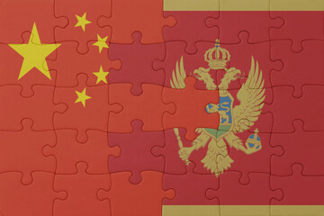 puzzle with the national flag of montenegro and china . macro.concept.