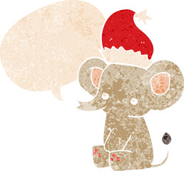cute christmas elephant with speech bubble in grunge distressed retro textured style