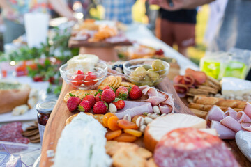 Grazing table antipasto food of cheese meats and berries