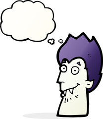 cartoon vampire head with thought bubble