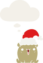 cute cartoon bear with christmas hat with thought bubble in retro style