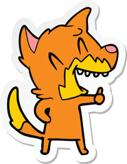 sticker of a laughing fox cartoon
