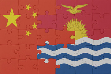puzzle with the national flag of Kiribati and china . macro.concept.