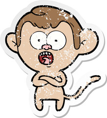 distressed sticker of a cartoon shocked monkey