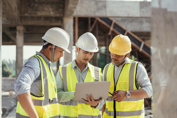 Building Project with Civil Engineer, Contractor and Architect discussing plan details.
