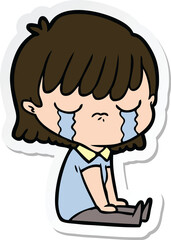 sticker of a cartoon woman crying