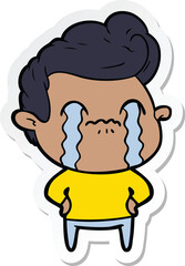 sticker of a cartoon man crying