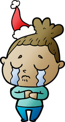 Obraz premium hand drawn gradient cartoon of a crying woman wearing santa hat