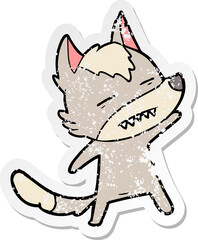 distressed sticker of a cartoon wolf showing teeth