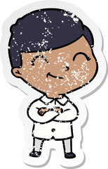 distressed sticker of a cartoon boy smiling