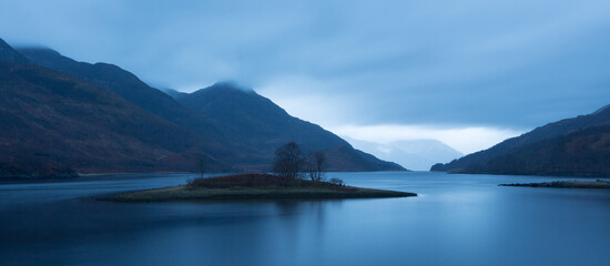 Loch Leven in winter, St. Serf's Inch, Perth and Kinross, Scotland, UK. Long exposure, dark scene, copy space, tourism, background, banner