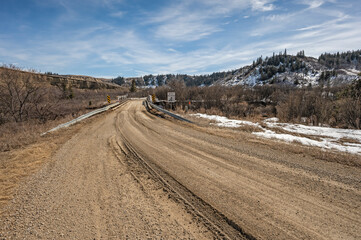 Gravel road crossing the Rosebud River at the ghost town of Beynon, Alberta, Canada