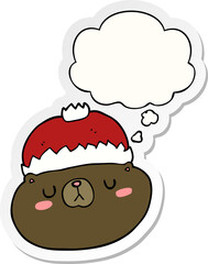 cartoon christmas bear with thought bubble as a printed sticker