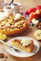 Apple pie with walnuts - typical autumn dish