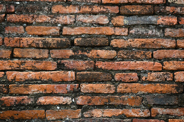 Damaged and old brick wall texture.