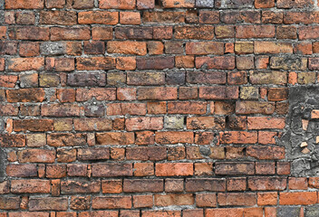Damaged and old brick wall texture.