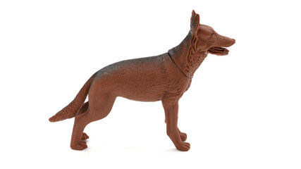  German Shepherd. Plastic dog toy isolated on white background. 