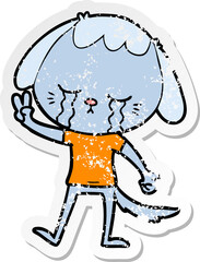 distressed sticker of a cartoon dog crying