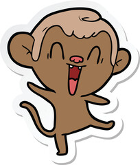 sticker of a cartoon laughing monkey