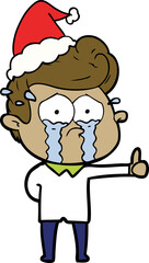 hand drawn line drawing of a crying man wearing santa hat
