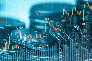 Fototapeta premium Double exposure of row coins city scape and stock market graph chart for economy and finance banking concept.