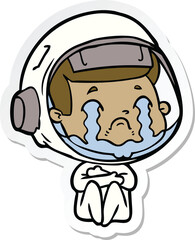 sticker of a cartoon crying astronaut