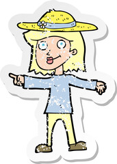 retro distressed sticker of a cartoon woman wearing hat