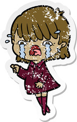 distressed sticker of a cartoon girl crying