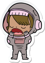 sticker of a cartoon talking astronaut yawning