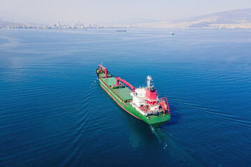 Dry cargo grain ship underway on sea, Bulk carrier or bulker merchant ship for transport bulk cargo. Aerial shot