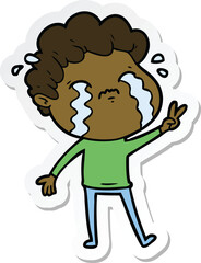 sticker of a cartoon man crying