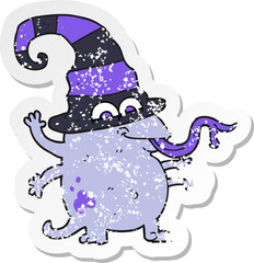 retro distressed sticker of a cartoon halloween alien