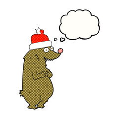 freehand drawn thought bubble cartoon bear wearing christmas hat