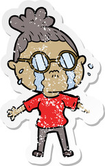 distressed sticker of a cartoon crying woman wearing spectacles