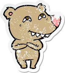 distressed sticker of a cartoon bear showing teeth