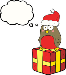 freehand drawn thought bubble cartoon robin on present
