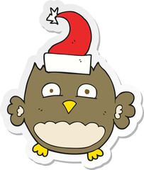 sticker of a cartoon owl wearing christmas hat