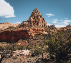 Fototapeta premium USA, Utah, Capitol Reef National Park. The Castle rock formation and Fremont River. Beautiful Pectols Pyramid from the Hickman Bridge Trail of Capitol Reef National Park at Utah