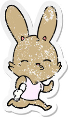 distressed sticker of a cartoon running rabbit