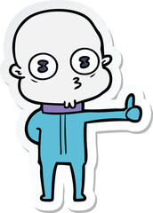 sticker of a cartoon weird bald spaceman giving thumbs up