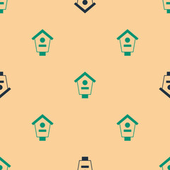 Green and black Bird house icon isolated seamless pattern on beige background. Nesting box birdhouse, homemade building for birds. Vector