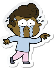 sticker of a cartoon crying man