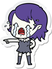 sticker of a cartoon crying vampire girl